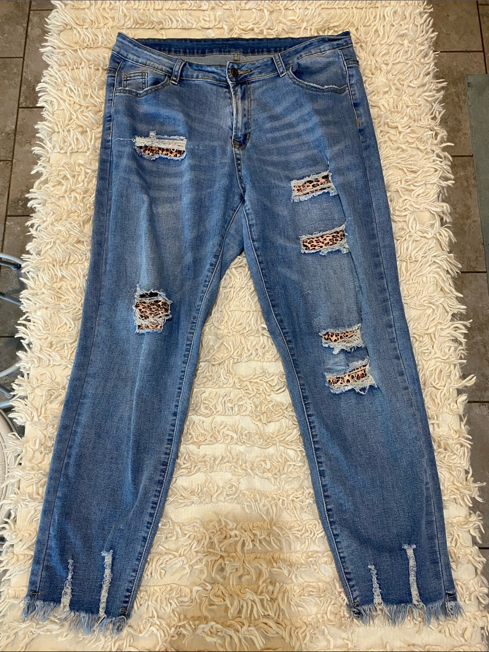 4/$20 ripped blue jeans with leopard print patches